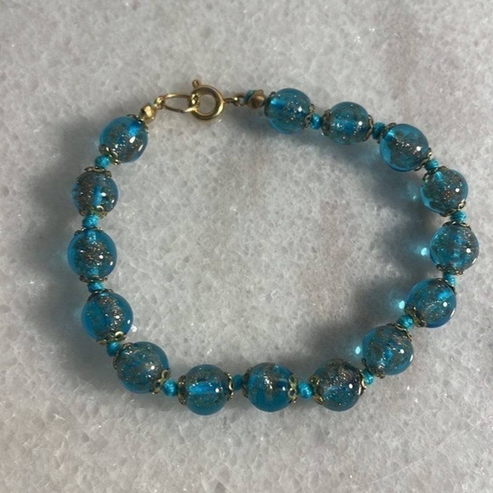 bracelet glass disc bracelet in iridescent aqua blue gold tone OS